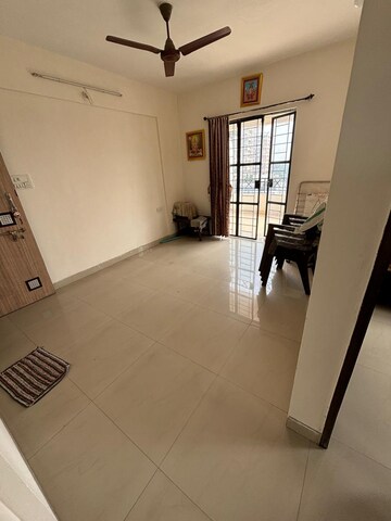 Living Room in 1 BHK Apartment at Vanaz Corner, Kothrud – for Rent