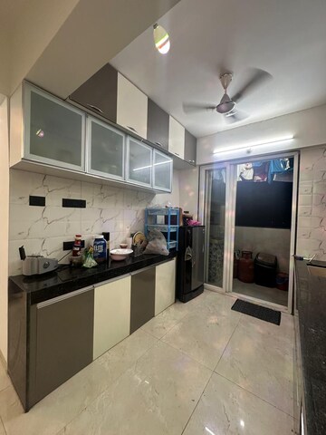 Kitchen in 2 BHK Apartment at LMS Finswell Woods, Viman Nagar – for Rent