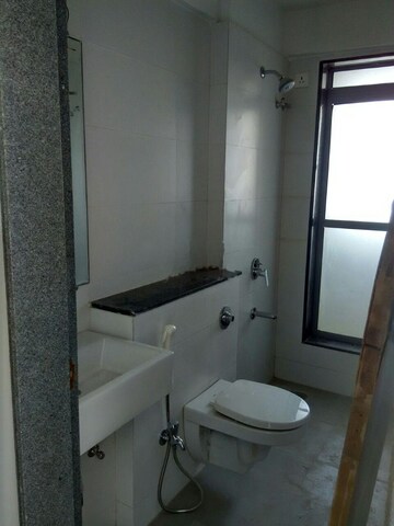 Bathroom in 2 BHK Apartment at Rajesh Raj Infinia, Malad West – for Rent