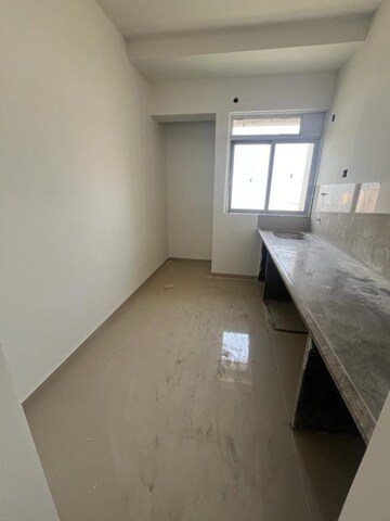 Kitchen in 2 BHK Apartment at Puraniks City Reserva, Ghodbunder Road – for Sale