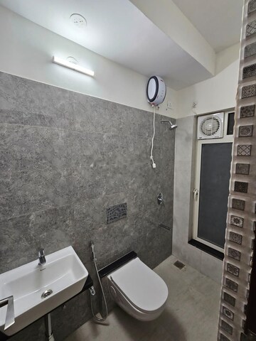 Bathroom in 1 BHK Apartment at Omkar Signet, Malad East – for Rent