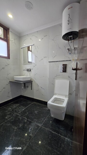 Bathroom in 2 BHK Builder Floor at Chattarpur – for Rent