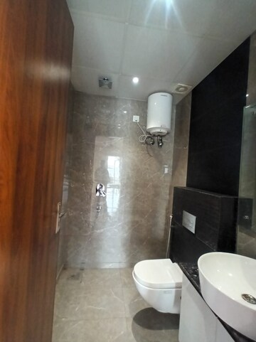 Bathroom in 4 BHK Apartment at Ansal API Esencia, Sector 67 – for Rent