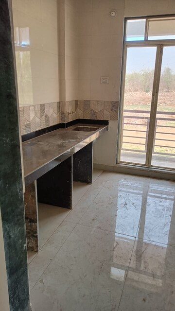 Kitchen in 1 BHK Apartment at Vaishnavi Dham Complex, Asangaon – for Sale