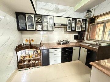 Kitchen in 2 BHK Apartment at Kanakia Spaces Niharika, Manpada – for Sale