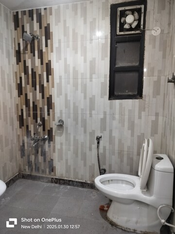 Bathroom in 1.5 BHK Builder Floor at Chattarpur – for Rent
