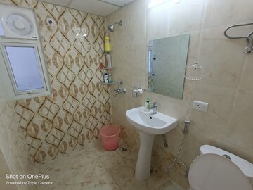 Bathroom in 2 BHK Apartment at Mahagun Mywoods II, Sector 16c Greater Noida – for Rent