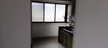 Kitchen in 1 BHK Apartment at Arjun CHS Vasant Vihar, Vasant Vihar – for Rent