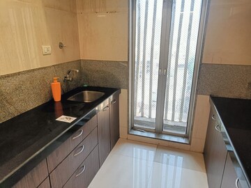 Kitchen in 2 BHK Apartment at Sadguru Complex I, Goregaon East – for Rent