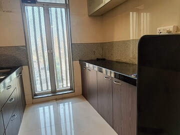 Kitchen in 2 BHK Apartment at Sadguru Complex I, Goregaon East – for Rent