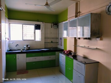 Kitchen in 2 BHK Apartment at Shantiniketan Society, Warje – for Rent