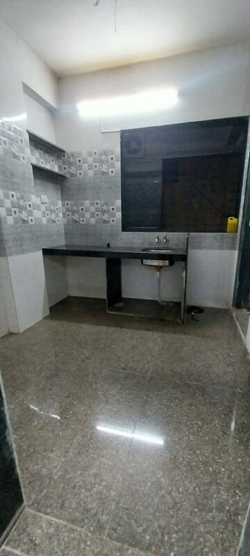 Kitchen in 1 RK Apartment at Ghansoli Sector 4 – for Rent