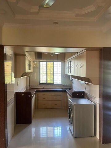 Kitchen in 2 BHK Apartment at Gulmohar Upvan CHS, Gawand Baug – for Rent