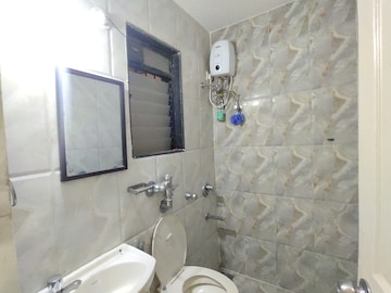 Bathroom in 2 BHK Apartment at Suncity Complex, Powai – for Rent