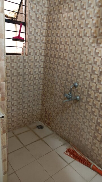 Bathroom in 1 BHK Apartment at Vardhaman Township, Hadapsar – for Rent