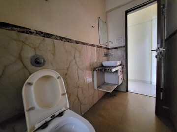 Bathroom in 2 BHK Apartment at Cosmopolis Tower, Andheri West – for Sale
