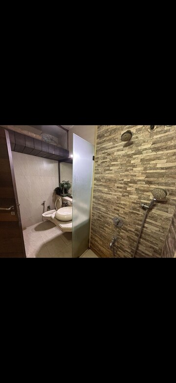 Bathroom in 4 BHK Apartment at Rustomjee OZone, Goregaon West – for Rent