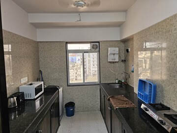 Kitchen in 2 BHK Apartment at Millionaire Heritage, Andheri West – for Rent