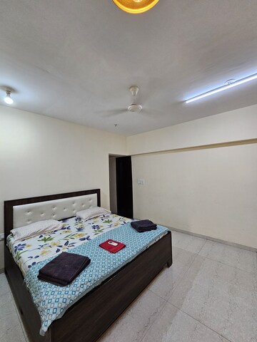 Bedroom in 2 BHK Apartment at Millionaire Heritage, Andheri West – for Rent