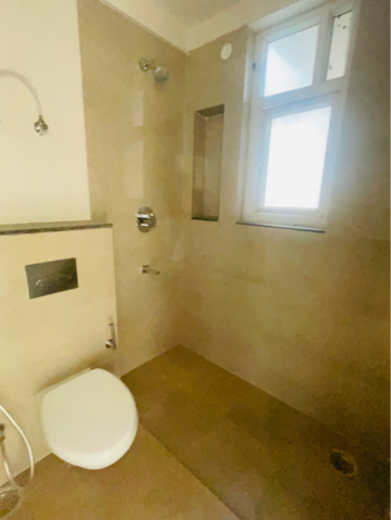 Bathroom in 3 BHK Apartment at ATS Triumph, Dhanwapur – for Rent