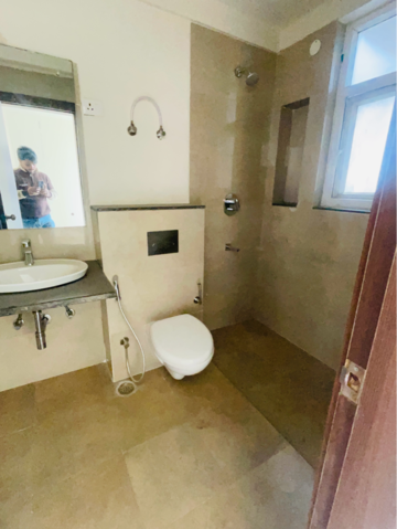 Bathroom in 3 BHK Apartment at ATS Triumph, Dhanwapur – for Rent