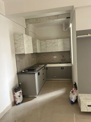 Kitchen in 2 BHK Apartment at Signature Global Orchard Avenue, Sector 93 – for Rent