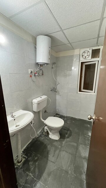 Bathroom in 2 BHK Apartment at Signature Global Orchard Avenue, Sector 93 – for Rent