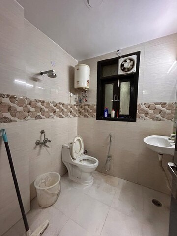Bathroom in 2 BHK Builder Floor at Chattarpur – for Rent