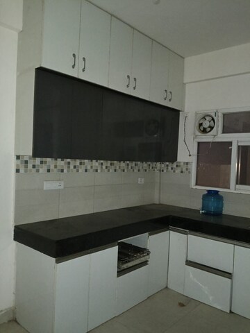 Kitchen in 2 BHK Apartment at Signature Global Orchard Avenue, Sector 93 – for Rent