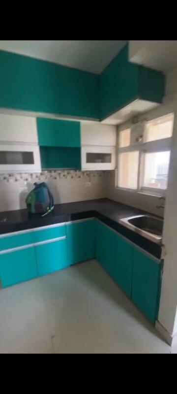 Kitchen in 2 BHK Apartment at Signature Global Orchard Avenue, Sector 93 – for Rent
