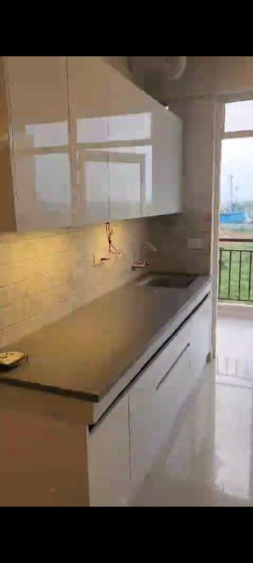 Kitchen in 2 BHK Apartment at Signature Global Orchard Avenue, Sector 93 – for Rent
