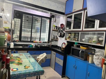Kitchen in 2 BHK Apartment at Shankar Tower, Sanpada – for Sale