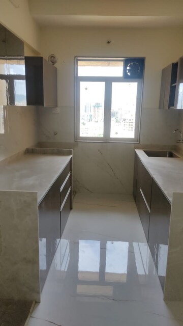 Kitchen in 2 BHK Apartment at Ani Anu Sri Balaji Enclave, Malad West – for Sale