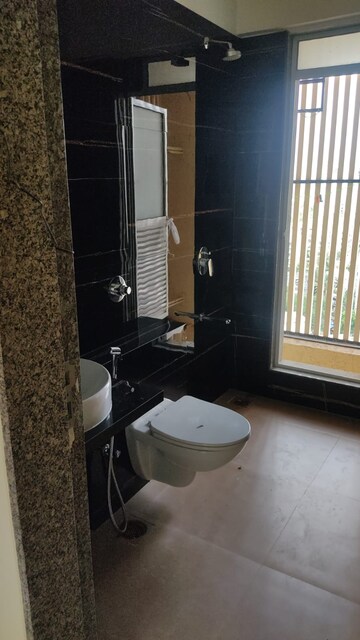 Bathroom in 2 BHK Apartment at Ani Anu Sri Balaji Enclave, Malad West – for Sale
