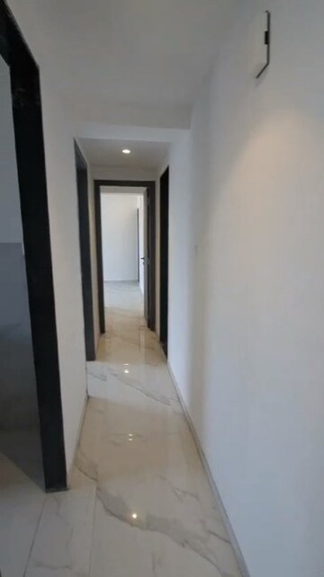 Building Lobby in 2 BHK Apartment at Dev Leo Tower, Oshiwara – for Rent