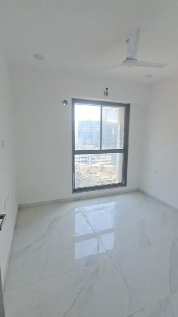 Room in 2 BHK Apartment at Dev Leo Tower, Oshiwara – for Rent