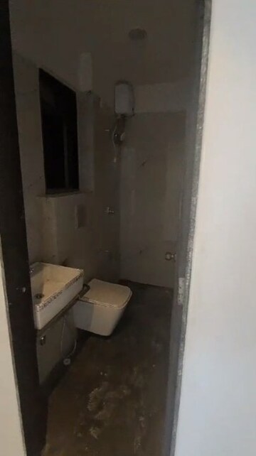 Bathroom in 2 BHK Apartment at Dev Leo Tower, Oshiwara – for Rent