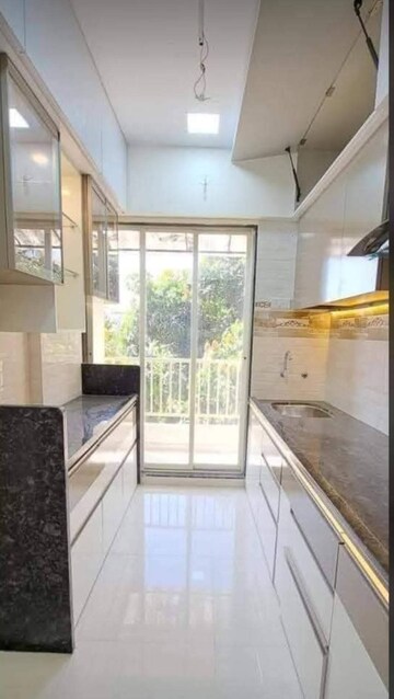 Kitchen in 1 BHK Apartment at Aurum Q Residences, Ghansoli – for Rent