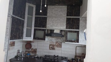 Kitchen in 2 BHK Apartment at Gaur City 2 - 11th Avenue, Sector 16c Greater Noida – for Rent