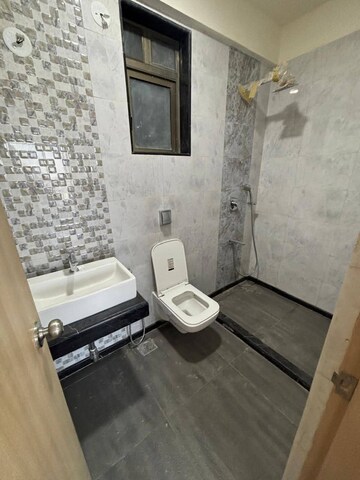 Bathroom in 2 BHK Apartment at Rajesh Raj Infinia, Malad West – for Rent