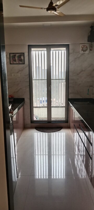 Bathroom in 1 BHK Apartment at Shree Tirupati STG Signature Residency, Ghodbunder Road – for Rent