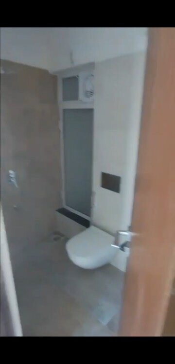 Bathroom in 2 BHK Apartment at Omkar Signet, Malad East – for Rent