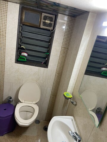 Bathroom in 2 BHK Apartment at Giri Vihar chs, Kandivali West – for Rent