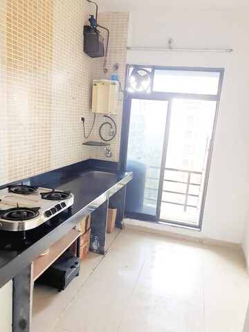 Kitchen in 2 BHK Apartment at Nand Sai Ganesh CHS Sector 50 Seawoods, Seawoods – for Sale
