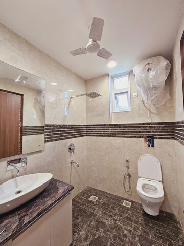 Bathroom in 4 BHK Builder Floor at SS Mayfield Gardens, Sector 51 – for Sale