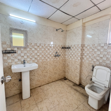 Bathroom in 3 BHK Apartment at SKA Greenarch, Panchsheel Green – for Rent