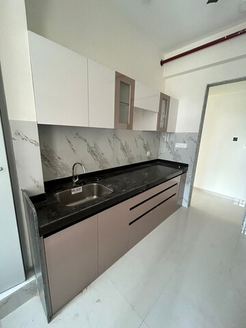 Kitchen in 1 BHK Apartment at Omkar Vive, Kurla – for Rent