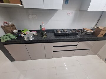 Kitchen in 2 BHK Apartment at Rustomjee Urbania Azziano L Wing, Majiwada – for Rent