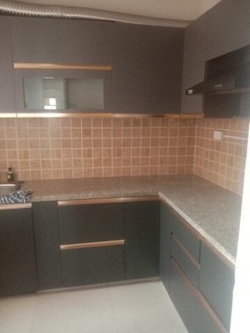 Kitchen in 2.5 BHK Apartment at Mahagun Mywoods, Sector 16c Greater Noida – for Rent