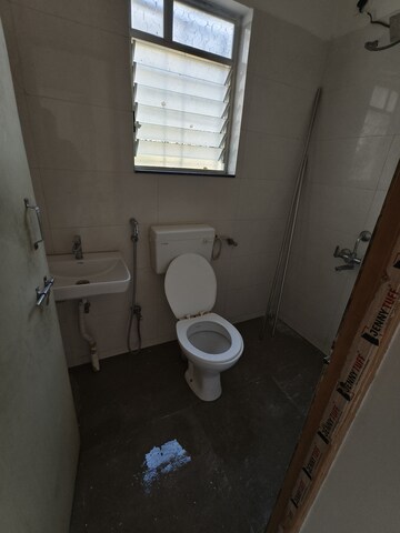 Bathroom in 1 BHK Apartment at Sambhav Classis Apartment, Wadgaon Sheri – for Rent